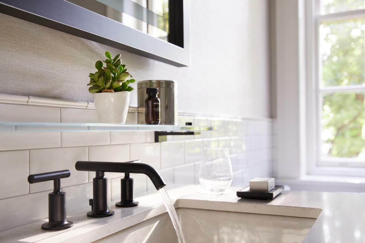 The Whitney Hotel Boston Extérieur photo A widespread lavatory faucet